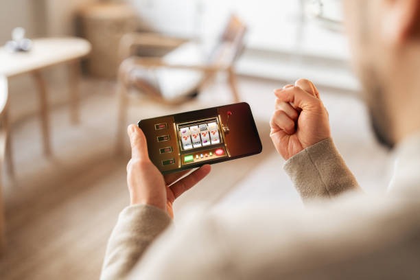 Mobile app interface showing live football and casino games